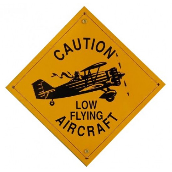The metal sign is CAUTION LOW FLYING